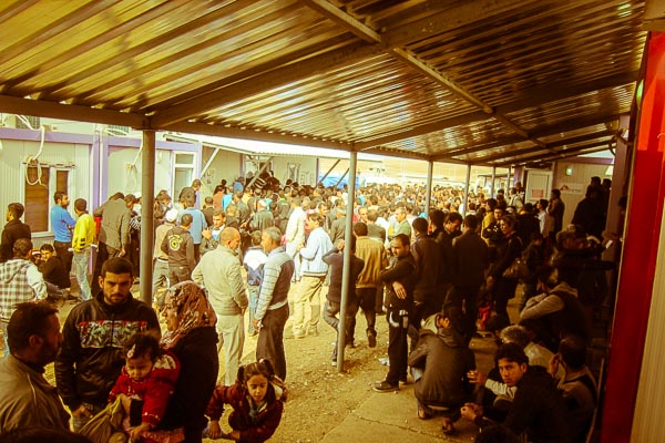 Crowds fill the area between the MSF primary health centre and UNHCR refugee registration area, November 2012