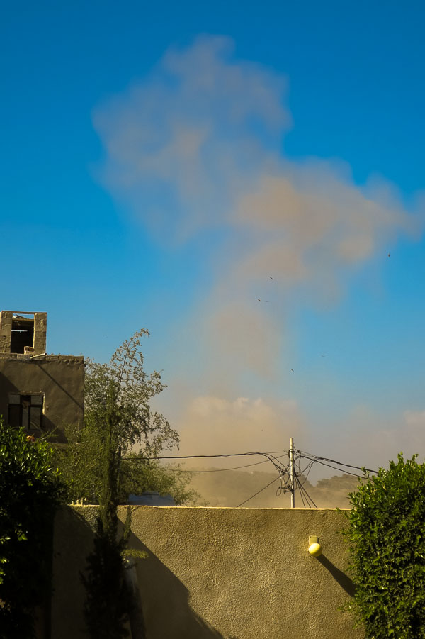 Smoke cloud after an airstrike near the MSF tented scabies clinic in Taiz, Yemen which killed one person and injured several